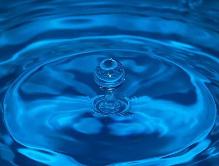 What negative effects can an increase in water temperature have on ultrapure water equipment?